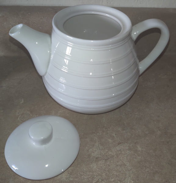 White Ribbed Teapot w/ (4) Small Teacups